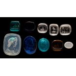 A group of ten coloured and clear glass intaglio seals: including a Roman head and shoulders bust