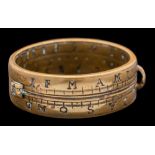 An early 18th Century brass pocket ring sundial: with adjustable central marker,