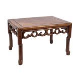 A Chinese Hua Li wood rectangular urn table:, with a pierced scroll apron,