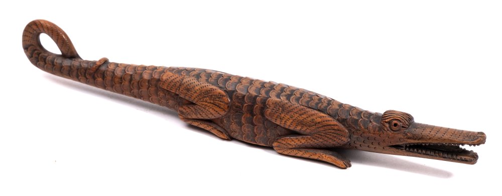 A 19th Century Swiss or Austrian novelty nutcracker: carved as a crocodile with open mouth and