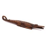 A 19th Century Swiss or Austrian novelty nutcracker: carved as a crocodile with open mouth and