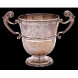 A Georgian Irish silver two-handled cup: marks worn, Dublin, crested,