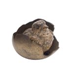 An Austrian bronze cold painted model of a chick emerging from a shell: stamped Geschutz, 50cm.