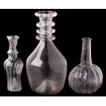 Three pieces of miniature glass: comprising a melon-shaped decanter with raised neck,