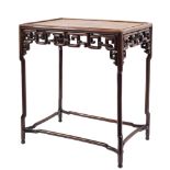 A Chinese Hua Li wood rectangular occasional table: with a moulded tray top and pierced geometric