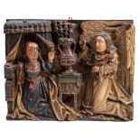 A late 15th Century oak and polychrome carved panel, The Annuciation: possibly North West Europe,