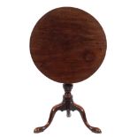 A mid 18th Century mahogany circular tea table: with a snap top,