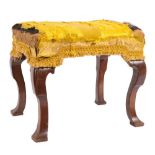 An early 18th Century walnut stool:, with a rectangular stuff over seat,