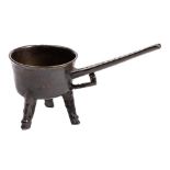 A very small mid 17th Century bronze skillet: on tapering legs with hoof feet,