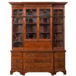 An unusual mid 18th Century mahogany breakfront secretaire library bookcase:,