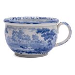 Three children's chamber pots: of traditional form transfer printed in blue and comprising a