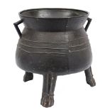 An important and massive 15th Century bronze cauldron: with founder's mark, a saltire cross,