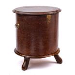 An early 18th Century oak circular drum-shaped commode:,