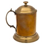 A George III period brass lidded tankard: of plain cylindrical outline with domed lift-off lid and