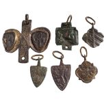 Six late Medieval horse harness pendants: includes two shield-shaped,