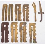 A group of various brass button sticks and two trench art letter openers:.