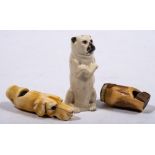 An early 20th century Continental porcelain pug dog whistle: with single reed to interior,