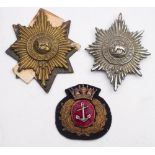 Two Worcestershire Regimental pouch badges and Merchant Marine cloth badge:.