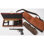 A Milbro Model 2 Gat style air pistol:, together with a cased gun cleaning kit,