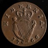 A 1776 Irish half penny, higher grade:.