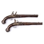 A pair of late 18th /early 19th century Turkish silver and gold decorated flintlock pistols:,