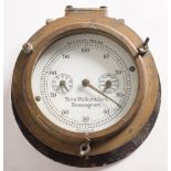 A circular brass bulkhead ship's log dial by Thomas walker & Son, Birmingham:,