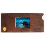 A 19th century hand painted magic lantern slipping slide of a sailing ship on a moonlit sea:,