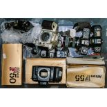 A collection of various Nikon 35mm camera bodies and accessories:, including F-50,