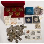 An 1884(o) silver Morgan dollar with other silver coins and mixed world.