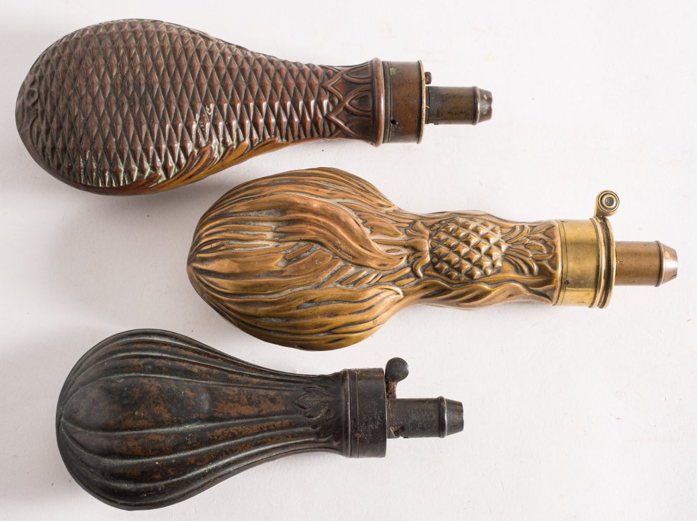 A copper and brass powder flask by Bartram & Co:,