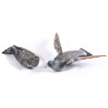 Two early 20th century carved and painted wood pigeon decoys:,
