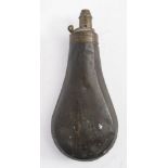 A copper and brass powder flask:, unsigned, 19cm long.