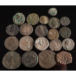 A collection of various Roman coins:.