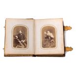 A Victorian brass bound leather carte de vistie album of the Royal family:,