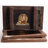 A 19th century hand painted magic lantern double slipping slide of a lion:,