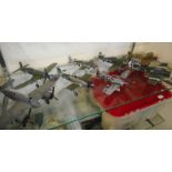 A collection of 1:48 and 1:32 scale model aircraft:, including P45 Mustangs and P47 Thunderbolts.