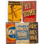 A group of eight aluminium magazine advertising signs:, including 'Woman and Home',