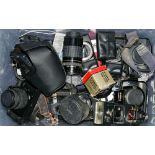 A collection of various Canon 35mm camera bodies and accessories:, including T50, EOS 1000F,