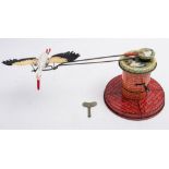 An Adebar (West Germany) No 7 tinplate clockwork flying stork:,