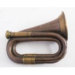 A copper and brass mounted post horn:, unsigned, 16cm long.