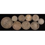 Nine silver foreign coins:.