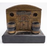 A late 19th /early 20th century painted wooden humidor in the form of a strongroom/warehouse:,