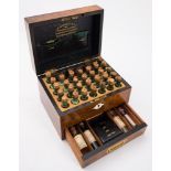 A Victorian walnut domestic medicine box by 'J M Rendall MPS Wholesale And Retail Homeopathic