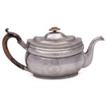 A George III Irish silver teapot, maker Robert Breading, Dublin, 1807: crested,