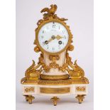 A French marble and ormolu mantel clock: the eight-day duration movement striking the hours and
