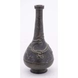 A Chinese bronze incense bottle in three sections: with slender neck and key fret rim,