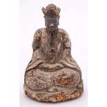 A Chinese carved wood figure of a Daoist deity: wearing flowing robes, seated in dhyanasana,