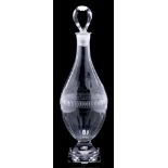 A Georgian glass decanter and stopper: of Indian Club shape with slice cut decoration and on square
