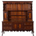 A late 18th Century oak, mahogany crossbanded and chequer inlaid dresser:,