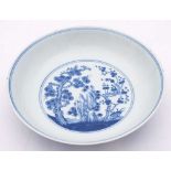 A Chinese blue and white 'Three Friends of Winter' saucer dish: the interior painted with a